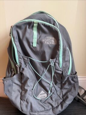 The North Face Jester Gray Backpack with Mint Green Accents